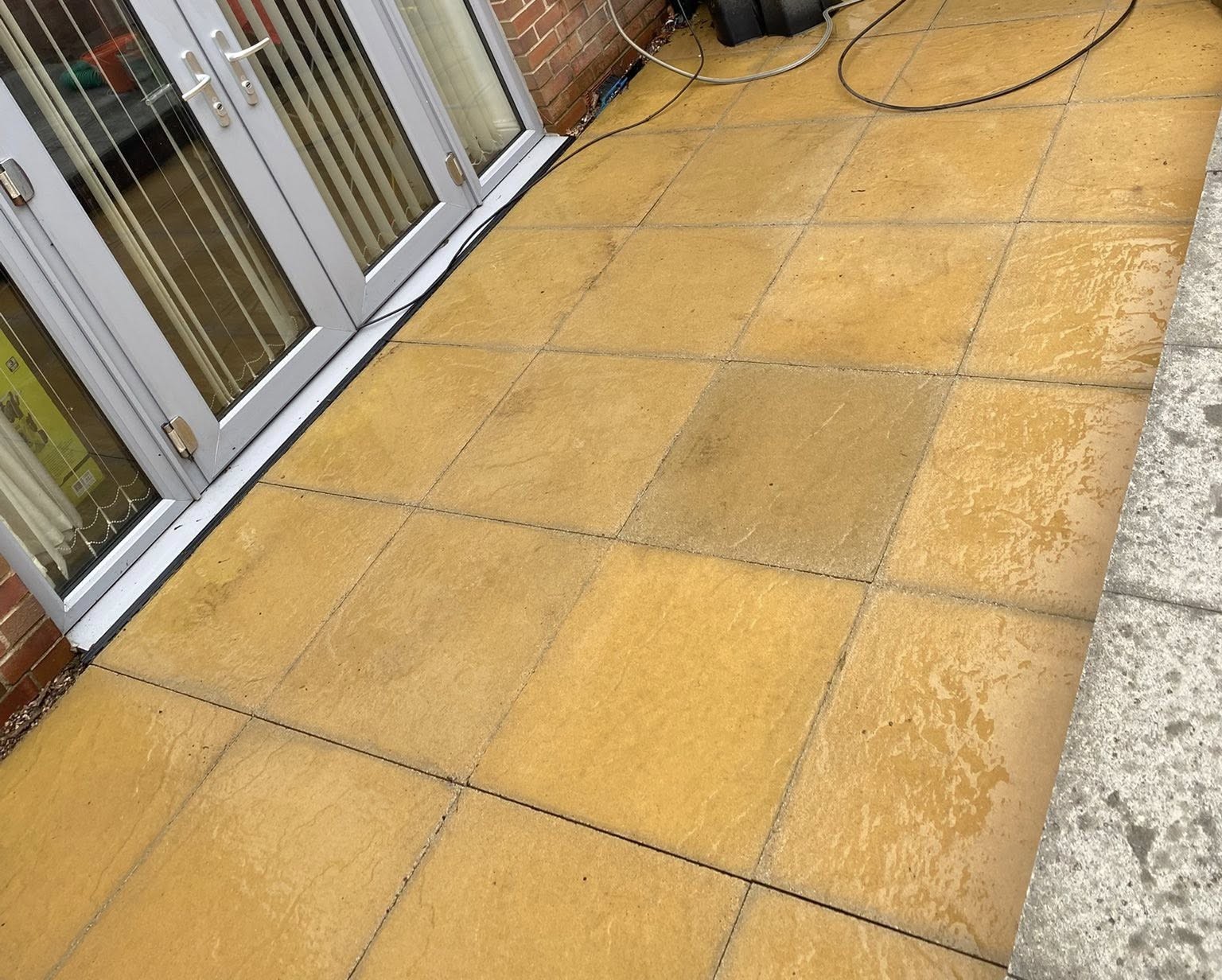 Patio after cleaning by CG Jetwashing